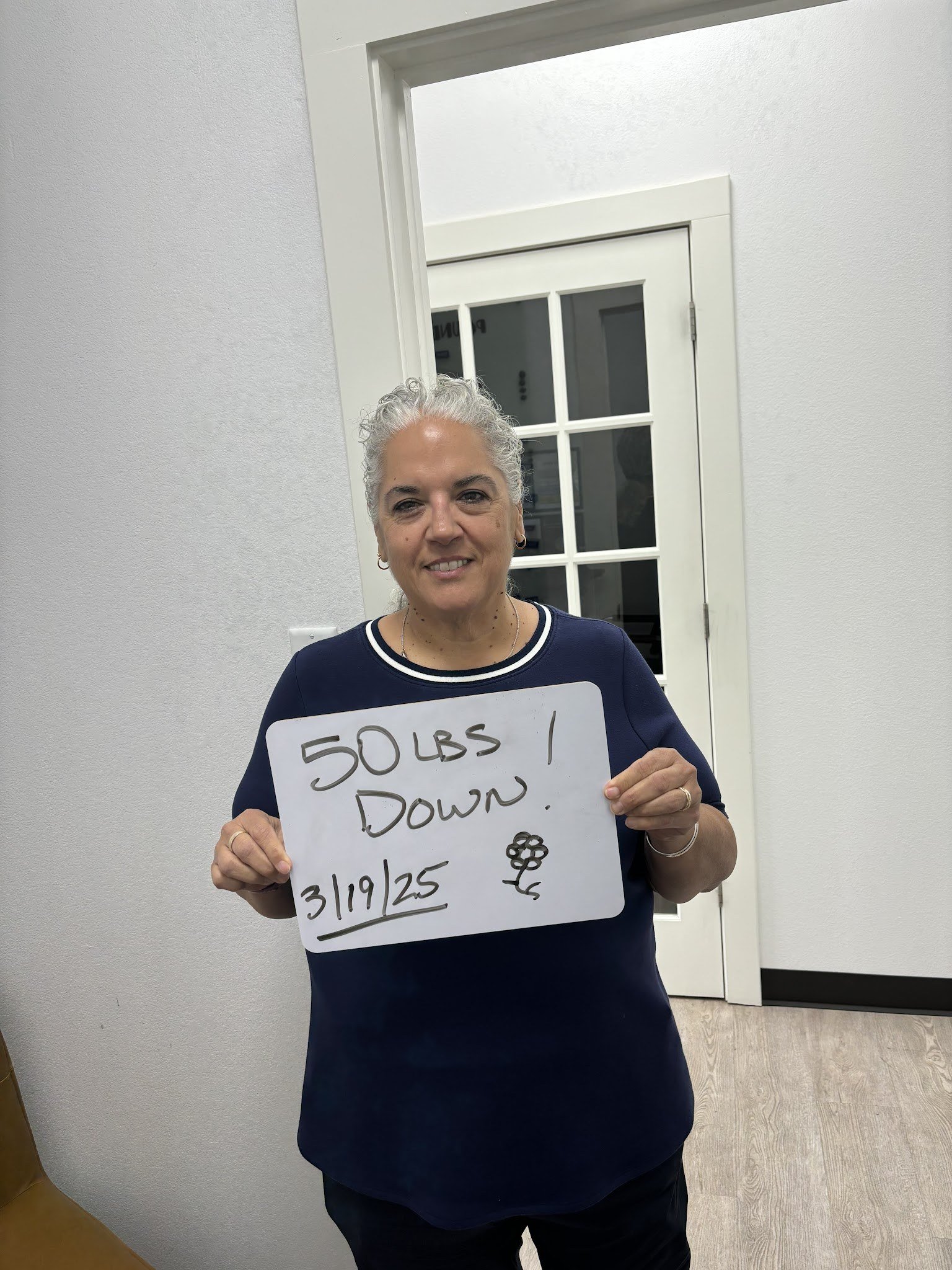 Ruth, Real Wellness MD member — 50 lbs down, 30+ inches lost